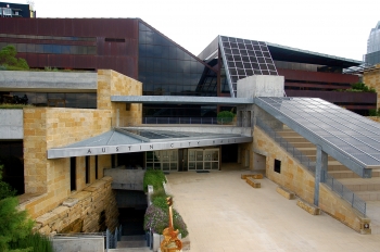 The City Hall in Austin, Texas was designed to reflect its natural surroundings. The four-story building incorporates local limestone, a waterfall and nonsymmetrical shapes, meant to reflect the waterways and canyons of the area. The building also includes amphitheater seating shaded by solar photovoltaic panels. An EPA Green Power Partner since September 2006, the City of Austin uses more than 370 million kilowatt-hours of renewable electricity annually. The City Hall in Austin, Texas was designed to reflect its natural surroundings. The four-story building incorporates local limestone, a waterfall and nonsymmetrical shapes, meant to reflect the waterways and canyons of the area. The building also includes amphitheater seating shaded by solar photovoltaic panels. An EPA Green Power Partner since September 2006, the City of Austin uses more than 370 million kilowatt-hours of renewable electricity annually.