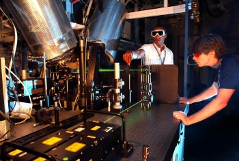 Researchers take laser-based velocity measurements at the Sandia National Laboratory's Combustion Research Facility. Researchers take laser-based velocity measurements at the Sandia National Laboratory's Combustion Research Facility.