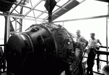 The "Gadget" device fully assembled atop the 100-foot firing tower, shortly before the Trinity test. July 15, 1945. The "Gadget" device fully assembled atop the 100-foot firing tower, shortly before the Trinity test. July 15, 1945.