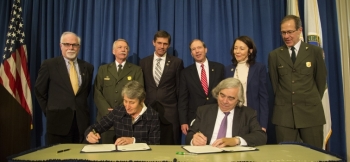 November 10, 2015: In a ceremony in the auditorium of the South Interior Building, Secretary of the Interior Sally Jewell and Secretary of Energy Ernest Moniz sign the MOA between the two agencies defining the respective roles in creating and managing the park. With the signing, the Manhattan Project National Historical Park officially is established.