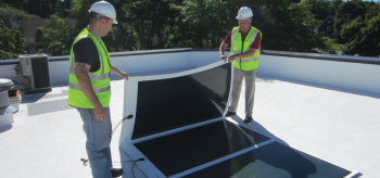 The Lightweight Integrated Module Package (IMP) developed under PVMI is a flexible, foldable, and modular solar panel assembly designed for quick and simple installation on flat commercial and industrial roofs without the need for heavy ballast. Photo Courtesy: SUNY Polytechnic Institute The Lightweight Integrated Module Package (IMP) developed under PVMI is a flexible, foldable, and modular solar panel assembly designed for quick and simple installation on flat commercial and industrial roofs without the need for heavy ballast. Photo Courtesy: SUNY Polytechnic Institute