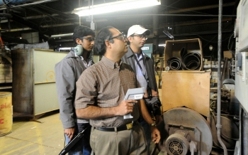 Energy assessment at Davis Lynch glass factory in Star City, West Virginia.<br /><em>Courtesy of WVU</em> Energy assessment at Davis Lynch glass factory in Star City, West Virginia.<br /><em>Courtesy of WVU</em>