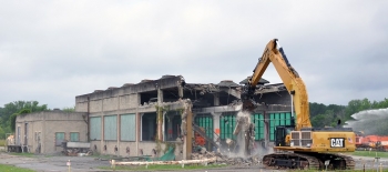 Workers tear down the K-832 Cooling Water Pumphouse.