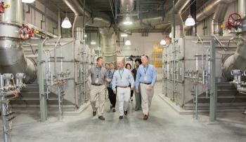 Pictured left to right, DOE-Savannah River SWPF Project Office Facility Representative Steve Stamper, Roger Jarrell and SRS Manager Jack Craig visit the Salt Waste Processing Facility (SWPF).