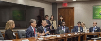 Energy Secretary Rick Perry gestures during a Sept. 7 meeting with visiting members of the Paducah (Ky.) Chamber of Commerce. Seated next to the Secretary is U.S. Rep. James Comer of Kentucky.