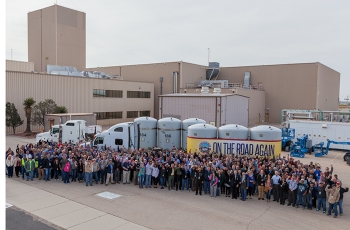 Waste Isolation Pilot Plant employees pose for a photo to celebrate the resumption of transuranic waste shipments to the facility.