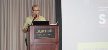 Stacey Thursby, (AECOMM, VPPPA National Board Member from a DOE site, VPPPA Awards Committee Chair) presents the VPPPA awards. Figure 15. Stacey Thursby, (AECOMM, VPPPA National Board Member from a DOE site, VPPPA Awards Committee Chair) presents the VPPPA awards.