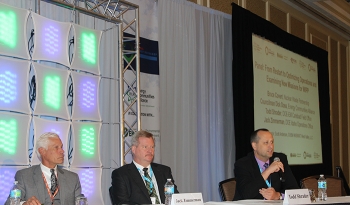 Carlsbad Field Office Manager Todd Shrader, right, speaks during the panel discussion. Moderator Scott Anderson, deputy general manager of CH2M Hill BWXT West Valley, LLC is left and Jack Zimmerman, deputy manager of DOE Idaho Operations Office, center.