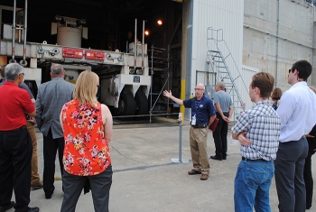 Savannah River Remediation Acting Director of Public Affairs and Project Communications Dean Campbell leads the fire protection engineers on a tour of the Defense Waste Processing Facility at the Savannah River Site.