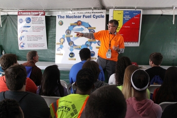 EMâs Jud Lilly directs a demonstration on the nuclear fuel cycle as part of Science Alliance.