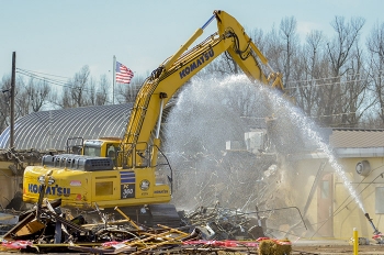 Crews demolished the C-212 office building.