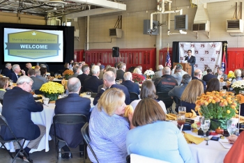 Employees, state legislators, stakeholders, local representatives, congressional staff members, and signatory and consulting party members attend a luncheon and preview of the K-25 History Center. Afterward, the attendees viewed plans for the facility.