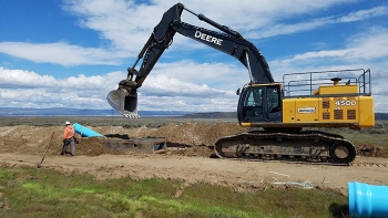 Workers with Watts Construction, a small business subcontractor for Mission Support Alliance, the Hanford Site services contractor, replace 70-year-old piping in the siteâs water distribution system.