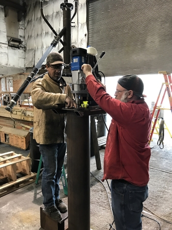 Workers at Diversified Metal Products, an Idaho Falls, Idaho-based small business, develop bin mockups to support Fluor Idahoâs Calcine Retrieval Project.