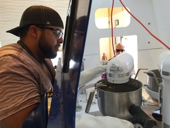 For several months, technicians practiced and refined the treatment method using a mock-up glovebox closely resembling the glovebox used during the actual treatment.
