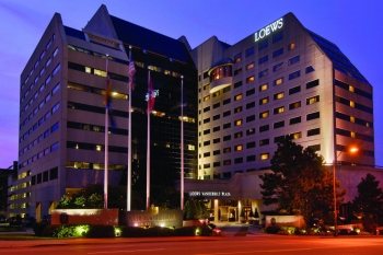 a night time shot of the loews vanderbil hotel.