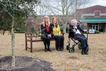 To commemorate Dr. Donald Orthâs contributions to SRS, a tree and bench have been placed on the grounds of the Savannah River Research Campus, near Aiken, S.C. The memorial was given by daughters Claudia (left) and Donna (middle), and wife Jean (right).