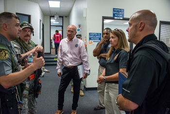 A situation briefing for members of Aiken County Coroner's Office, DOE Inspector General's Office, and FBI during the 2017 Active Shooter Emergency Preparedness exercise coordinated and conducted by Savannah River Nuclear Solutions Emergency Management.