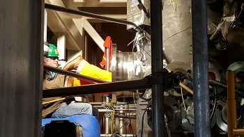 Tyson Pincock assists Ben Hobley in the welding of ½-inch-thick plates outside the Integrated Waste Treatment Unitâs Denitration Mineralization Reformer.
