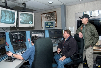 Energy Secretary Rick Perry participates in a demonstration of crane equipment at the H Canyon Chemical Separations Facility.