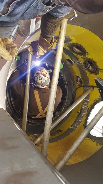A mockup of the Denitration Mineralization Reformer was invaluable in helping welders prepare for days of work inside the cramped quarters of the Integrated Waste Treatment Unitâs primary reaction vessel.