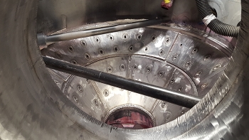 Workers tacked ½-inch-thick plates in place and followed up with welds.
