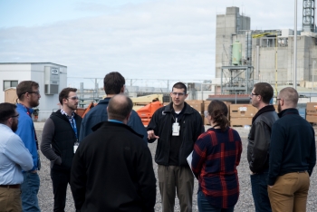 Savannah River Remediationâs Carl Scherman gives a tour of the Salt Waste Processing Facility to Reaching Engineers at the Development Years participants.