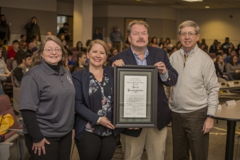 PPPO Paducah Site Lead Jennifer Woodard (far left) and PPPO Manager Robert Edwards (second from right) receive a Joint Proclamation from Paducah Mayor Brandi Harless and McCracken County Judge Executive Robert Leeper designating âDOE Science Bowl Month.â