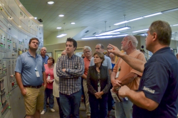 Paducah Site visitors observe control panels in the Central Control Building during the Paducah Site Tour.