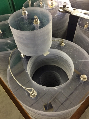 A closeup of a shielded container with the plug in the out position.