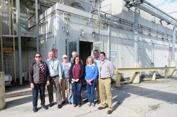 Federal Project Director Bill McMillan (second from left) led the tour at Oak Ridge National Laboratory, where participants are pictured in front of Building 3028.