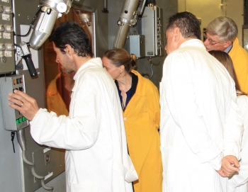 RATEN Institute engineers and NNSA experts observe process to safely remove high-activity radioactive sources prior to disposal.