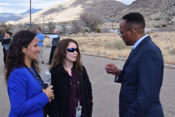 Office of Secure Transportation Assistant Deputy Administrator Vince Fisher, right, discusses the OST mission with Dr. Beatriz Cuartas, left, and an NNSA First Year participant.