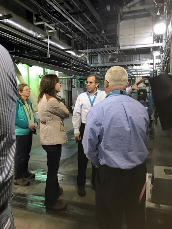 Integrated Waste Treatment Unit (IWTU) Operations Manager Craig Olson explains recent modifications to IWTU components to EM Assistant Secretary Anne Marie White during a tour of the facility.