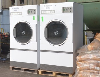 Shown are two of four excess government-owned commercial dryers to benefit clients of the Merryman House Domestic Crisis Center in Paducah.