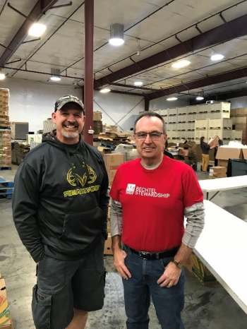Mission Support Alliance President Bob Wilkinson, left, and Bechtel Waste Treatment and Immobilization Plant Project Director Brian Reilly helped pack more than 6,100 Bite2Go food kits.