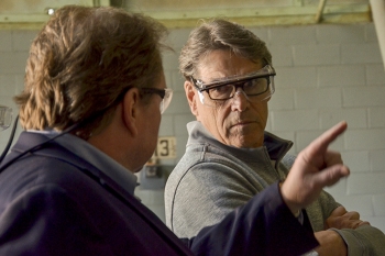 EM Portsmouth/Paducah Project Office Manager Robert Edwards (left) discusses with Secretary Rick Perry the strategy to accelerate the final remediation of the Paducah Site's largest groundwater contamination source.