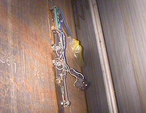 Cameras and sensors for inspections of aging tanks are deployed on wall crawler robots.