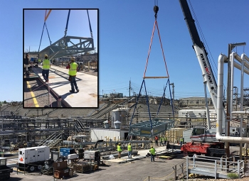 Workers begin installing the lower enclosure of the Tank Closure Cesium Removal module near Tanks 10 and 11 in H Tank Farm.