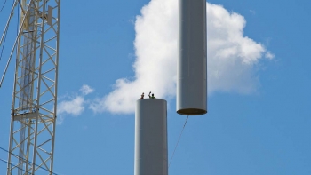Photo of a wind turbine mid-construction.