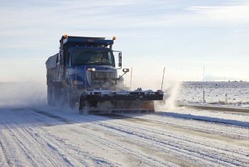 An MSA employee removes snow from Hanford roads.