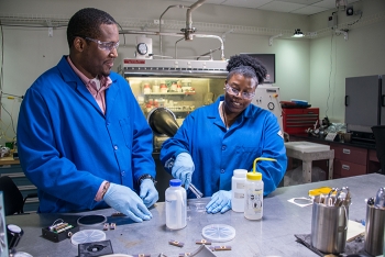 Chemar Huntley, right, postdoctoral research associate and her mentor, Savannah River National Laboratoryâs Aaron L. Washington II, left.