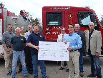 Donation to West Valley Fire, back row, left to right: Kevin Murray, West Valley Volunteer Fire Company chief; Tom Fontaine, CHBWV manager, radiological and industrial safety; Bryan Bower, EM WVDP site director; Paul Bembia, NYSERDA director; Jeff Bradfor