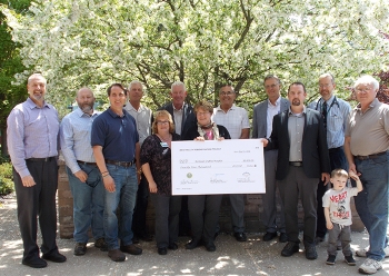 Donation to BCH, back row, left to right: Bryan Bower, EM WVDP site director; Ken Whitham, CHBWV, vice president, environmental, safety, health and quality; Scott Anderson, CHBWV deputy general manager; Jeff Bradford, CHBWV president and general manager;