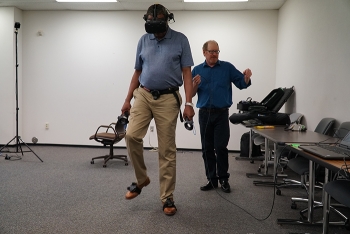 Savannah River Remediation (SRR) training specialist Julius Myers demonstrates a virtual reality program SRR is using to aid in slips, trips, and falls training.
