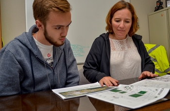 Logan Mitchell, left, intern for EMâs Paducah Site deactivation and remediation contractor, Four Rivers Nuclear Partnership (FRNP), and FRNP Property, Warehouse and Fleet Manager Jessica Pedersen.