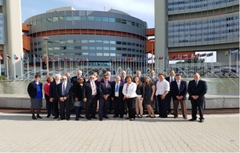 On May 21, 2018, US Delegates to the Sixth Review Meeting of the Contracting Parties of the Joint Convention gather at the Vienna International Center before the peer review sessions.