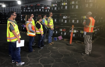 Fluor Idaho interns receive a briefing on transuranic waste shipping during a recent site tour.