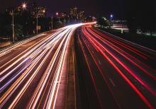 Photo of highway full of car lights.