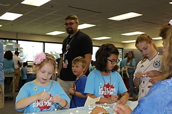 Using marshmallows and toothpicks, children construct buildings and learn about structural integrity.